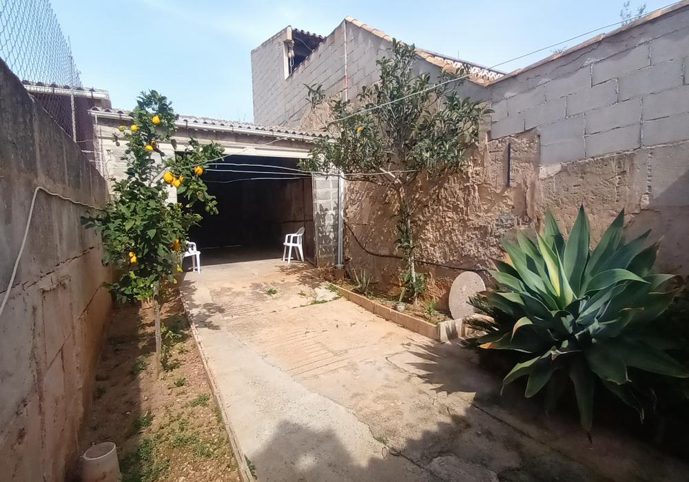 Imagen 1 Casa Adosada en venta en Santanyí / Vivienda de la plaza principal del pueblo