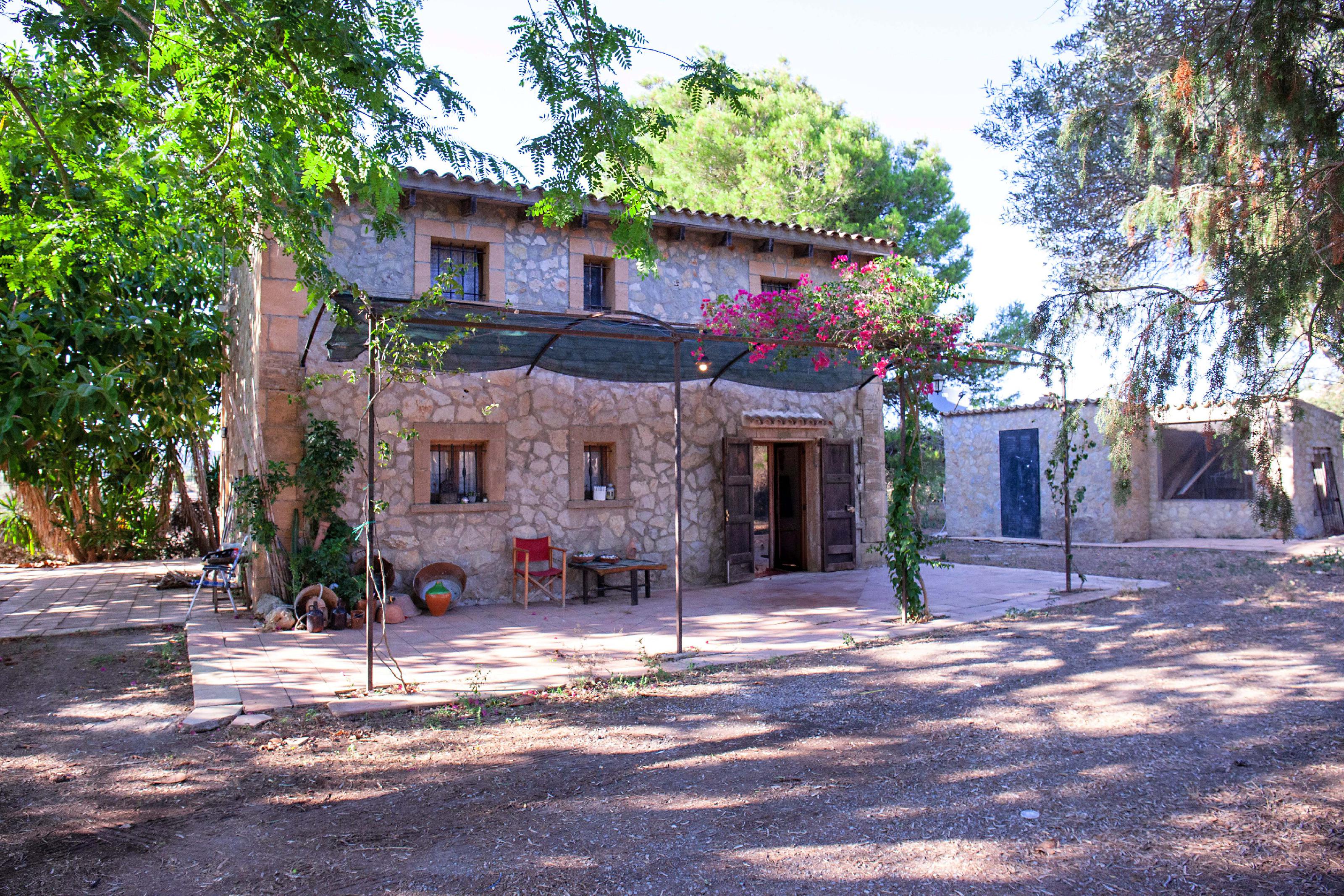 Imagen 1 Casa Rústica en venta en Manacor / Casa de campo rústica  parcela  en Son Talent  Manacor 