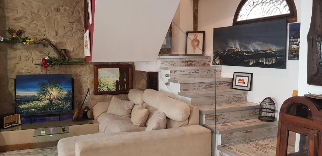 Imagen 1 Casa Adosada en venta en Baeza / En el centro de Baeza. Zona intramuros.